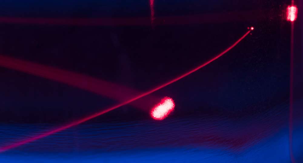 Lasers through fluid