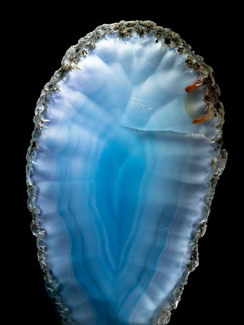 Blue striped agate slice - mineral photography tips