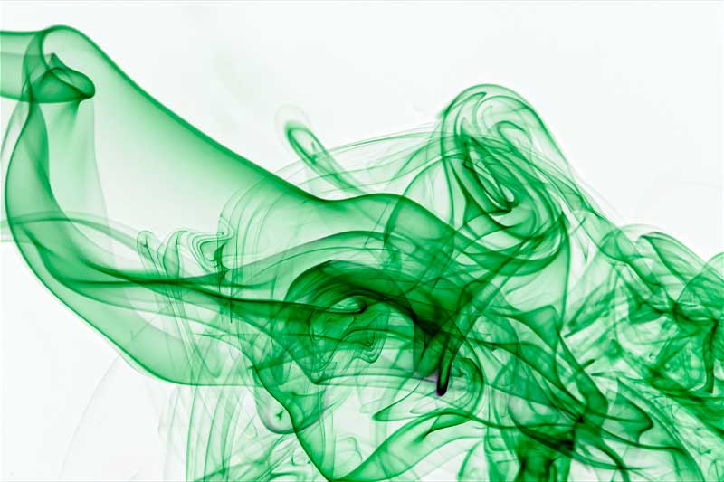 Green smoke on white background