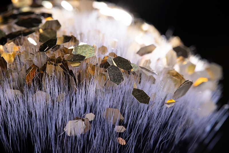 Gold glitter on a makeup brush