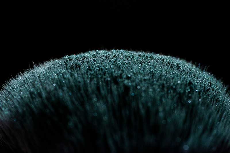 Macro glitter on a brush